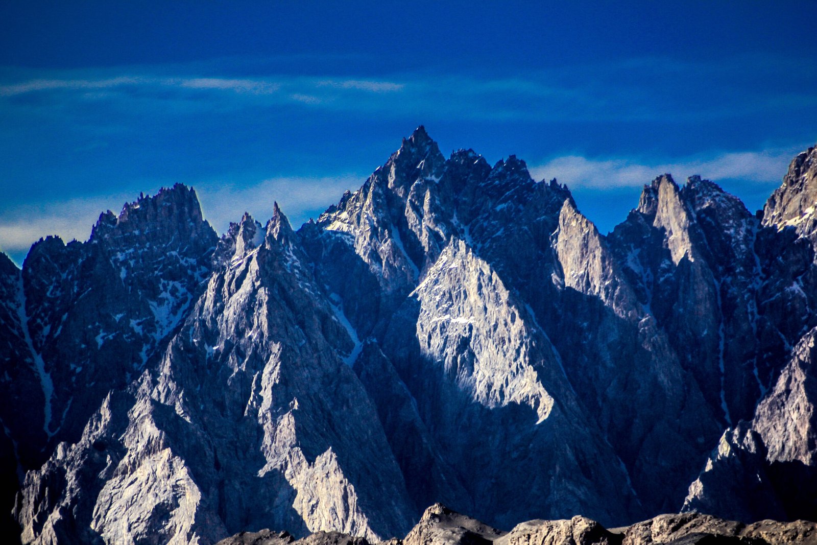 Passu Cones (Tupopdan) rising above the Hunza River in Gilgit-Baltistan