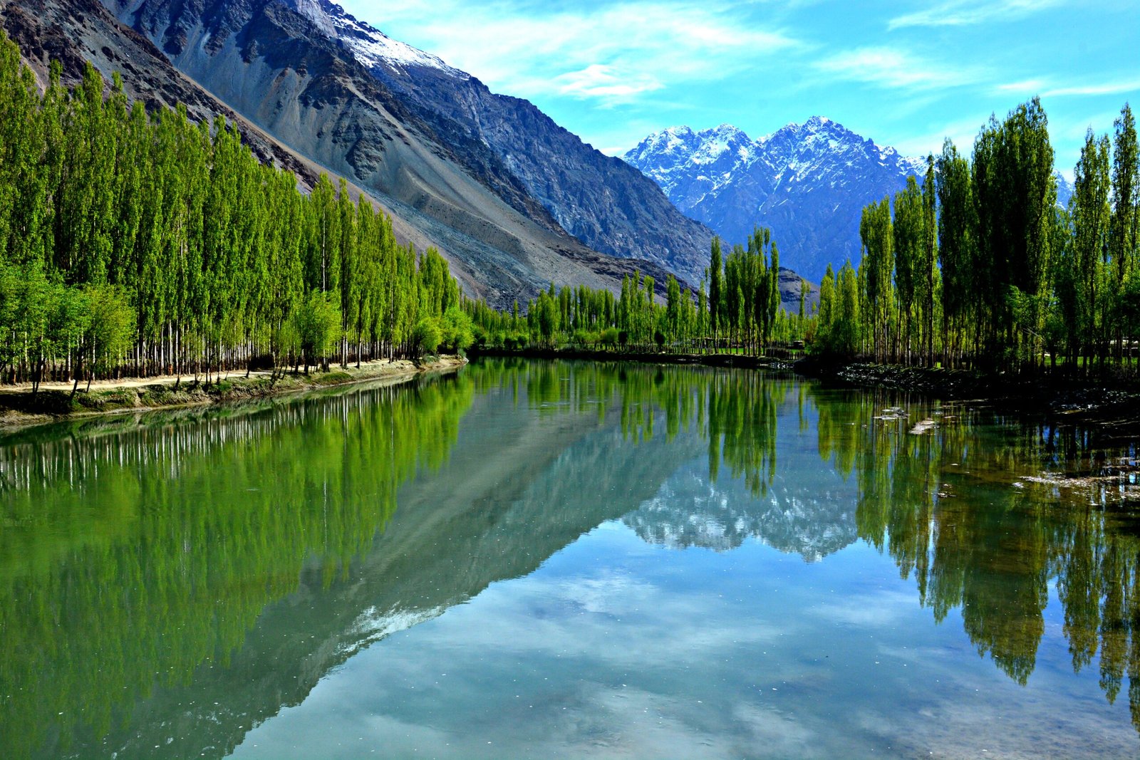 Morning light over Phander Lake in Ghizer Valley, one of the most peaceful places to visit in Pakistan